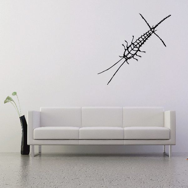 Fish skeleton wall decal with intersecting lines and spiky fins
