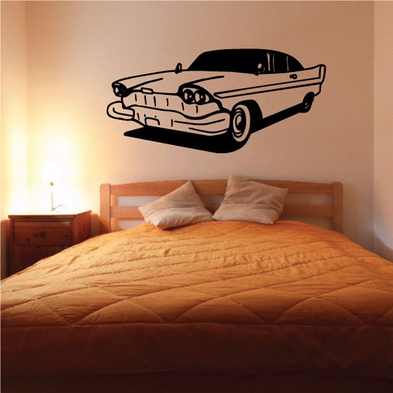 Classic car decal in black and gray, side profile with wheels and grille outline.