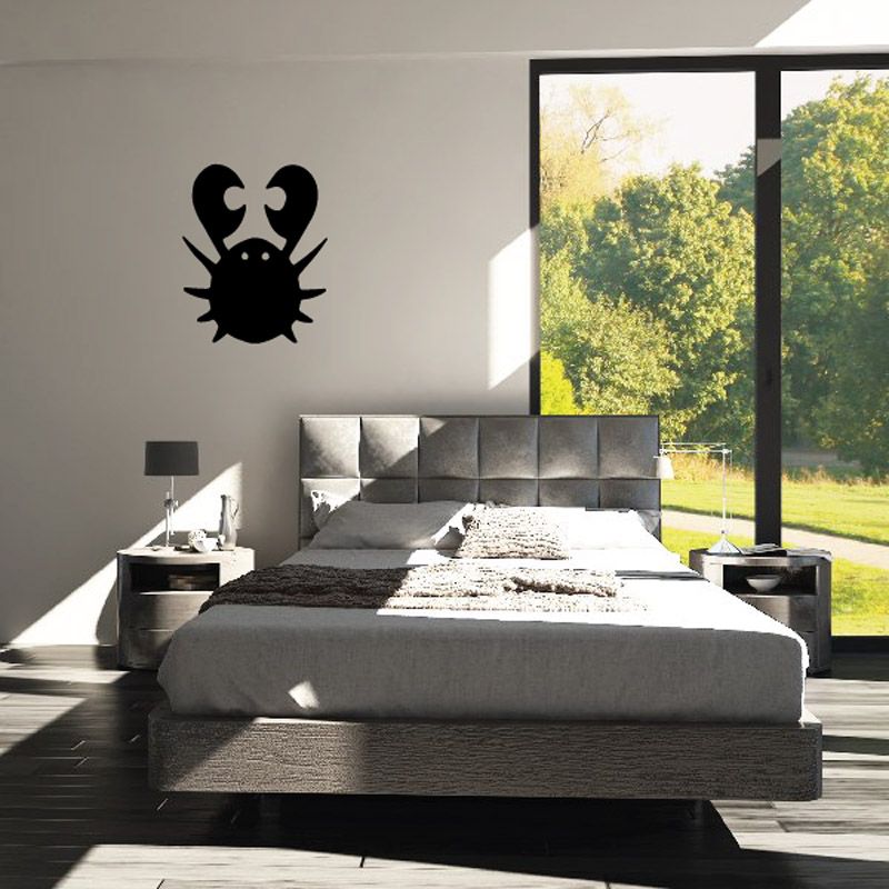 Black cartoon crab wall decal sticker with raised claws and legs