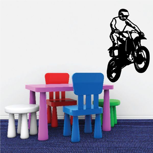 Black dirt bike rider decal, stylized helmeted rider on motorcycle silhouette