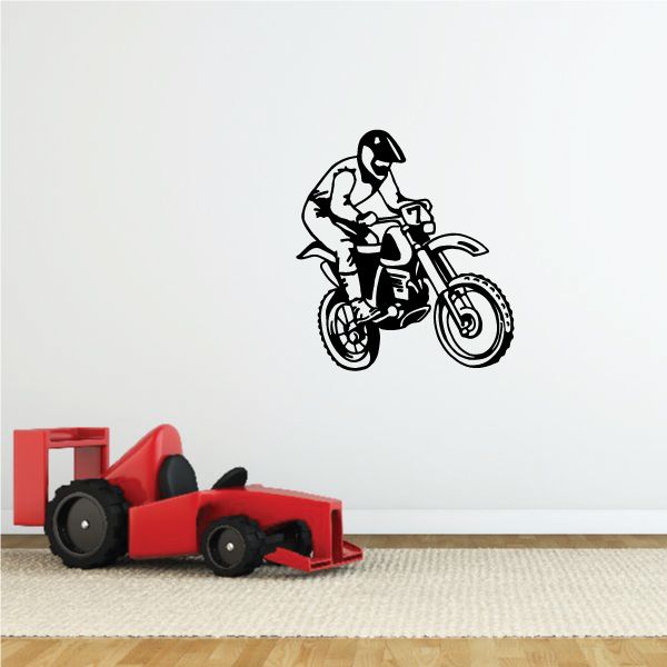 Dirt bike rider decal in black, on motorcycle