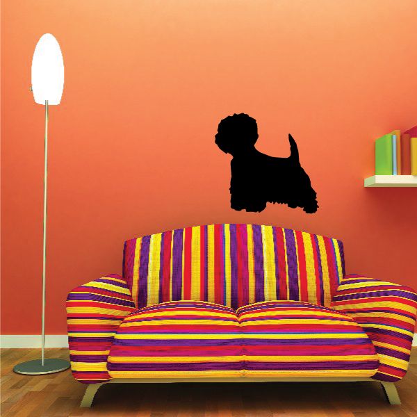 Black West Highland Terrier decal silhouette on a wall above a couch