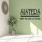 Wall decal with “Sisters” script and “make the best of friends” text, plus wreath