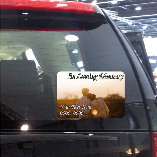 Memorial window sticker: 'In Loving Memory' over couple silhouette