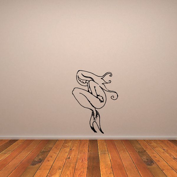 Sitting mermaid decal with line-art silhouette, black outlines and flowing tail.
