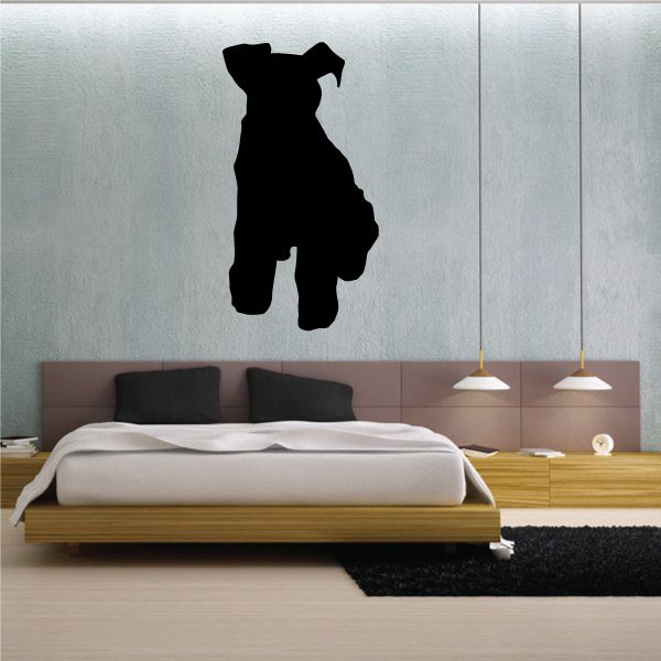 Sitting scottie dog decal, black silhouette on a wall