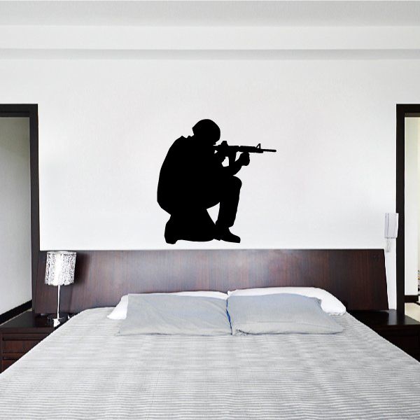 Sitting soldier aiming wall decal, black silhouette