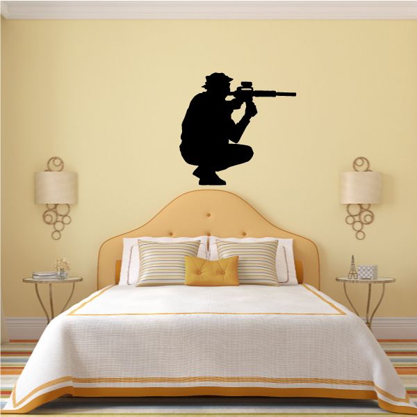 Sitting soldier aiming rifle wall decal, black silhouette