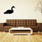 Sitting swan decal in black, wall-mounted silhouette