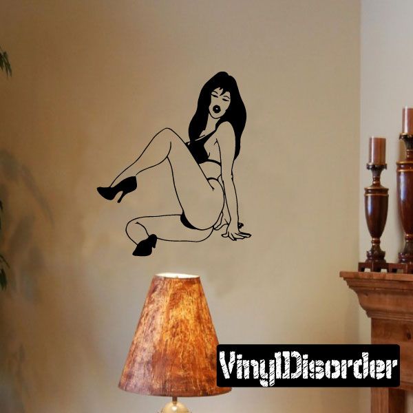 Sitting woman bikini and heels decal, black line art silhouette in seated pose.