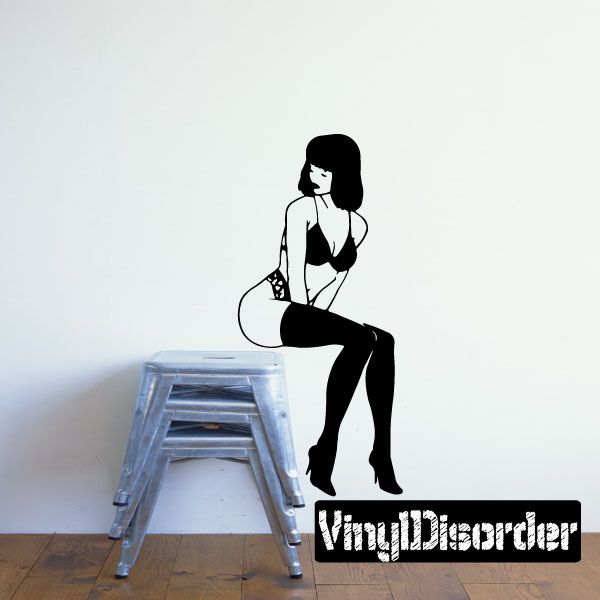 Pinup woman lingerie wall decal: black sitting silhouette on stool with logo text