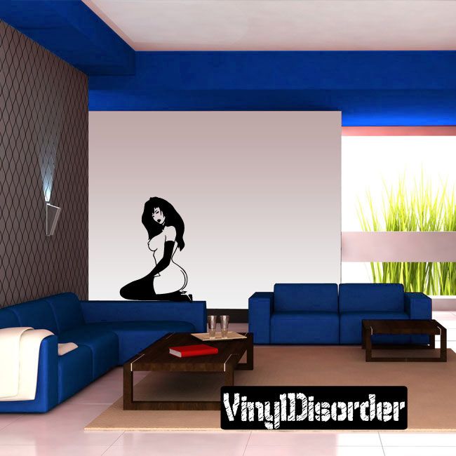 Vinyl decal of seated woman in thigh-high stockings and gloves