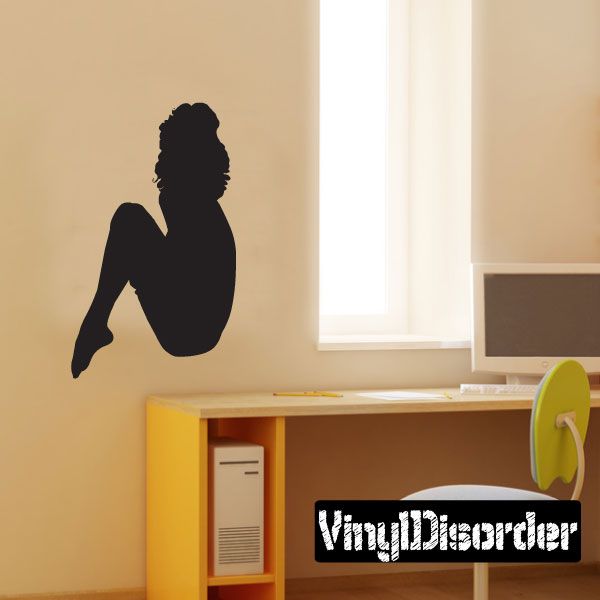 Sitting woman silhouette wall decal, black figure with seated pose and arm raised