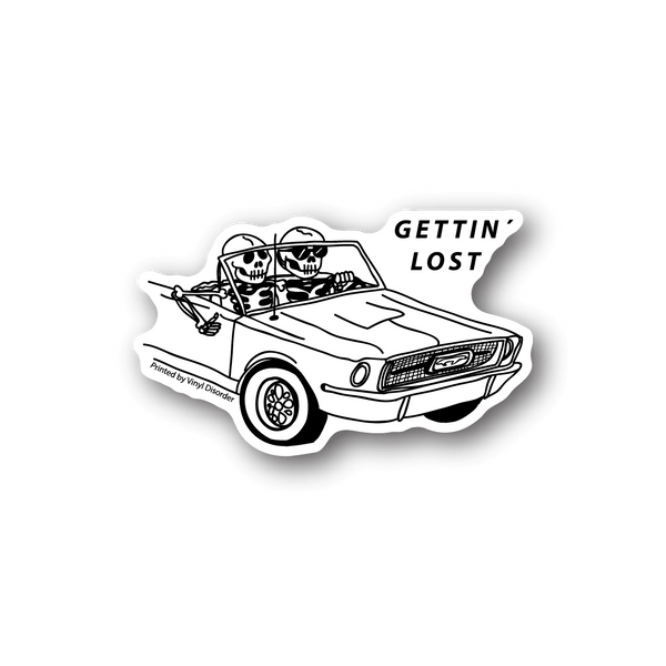 Skeleton vinyl sticker with two skulls in a car, 'GETTING LOST' text