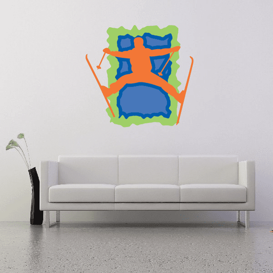 Skiing wall decal sticker: orange skier with blue skis on green background