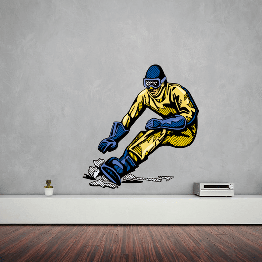 Skiing wall decal of a yellow and blue skier in action, die-cut vinyl sticker