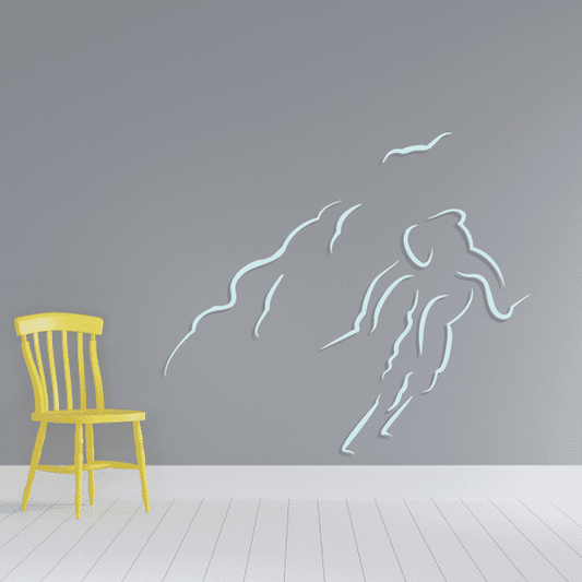 Skiing wall decal vinyl sticker with light blue skier silhouette.