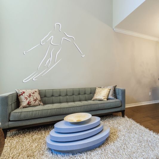 Skiing wall decal sticker with outline skier figure and ski poles, light gray.