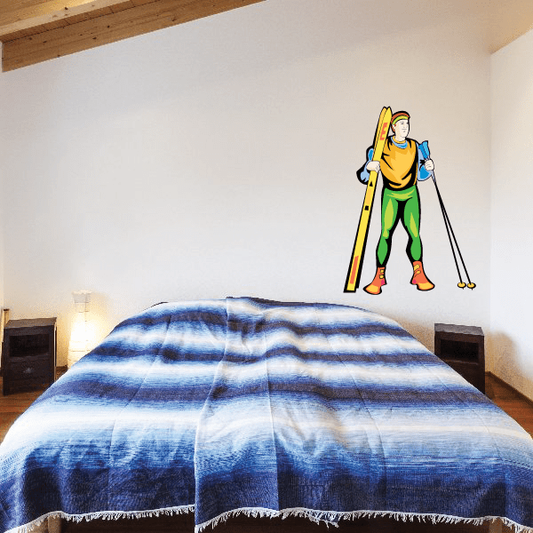 Skiing wall decal vinyl sticker of a skier holding poles, die-cut