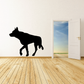 Skittish wolf decal: black wolf silhouette on a light wall
