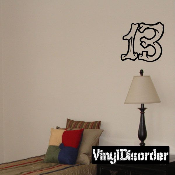 Black vinyl wall decal showing a skull inside the number 13