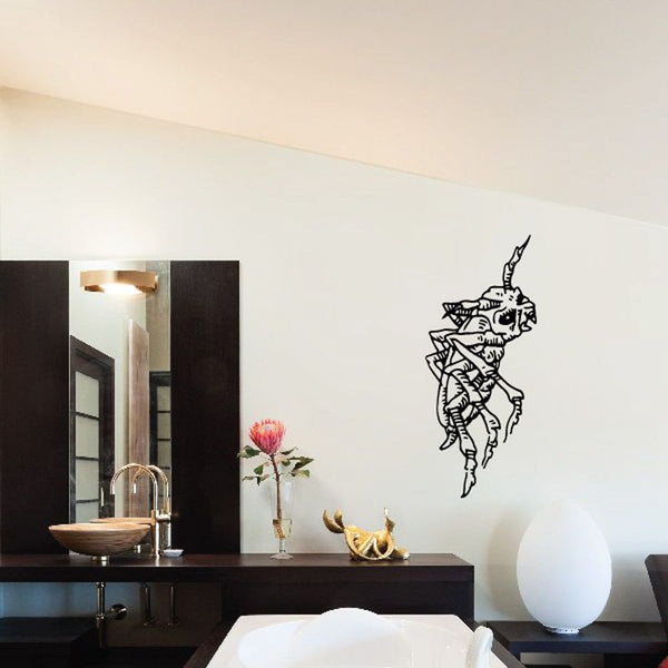 Black line-art skull-face roach decal with detailed wings and claws