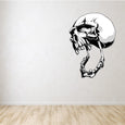 Minimalist room with a stark white wall featuring a skull decal