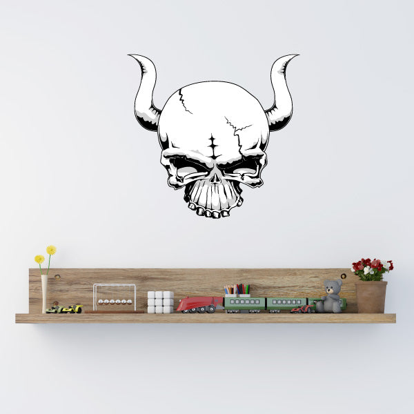 Decorative shelf displaying a skull with horns wall sticker