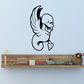 Black vinyl skull wall decal with wings and curled ornament, removable sticker