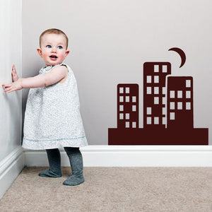Maroon city skyline wall decal with moon crest and small building windows