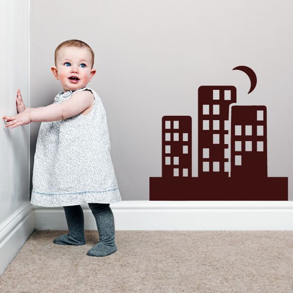 Maroon city skyline wall decal with moon crest and small building windows