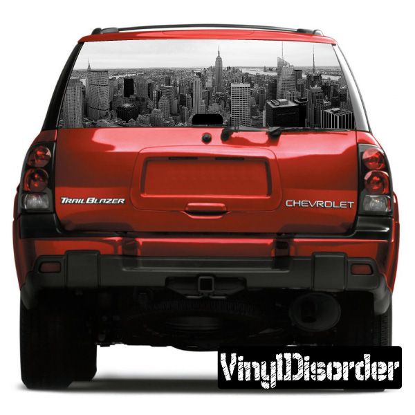 Red SUV rear hatch with skyline graphic rear window view
