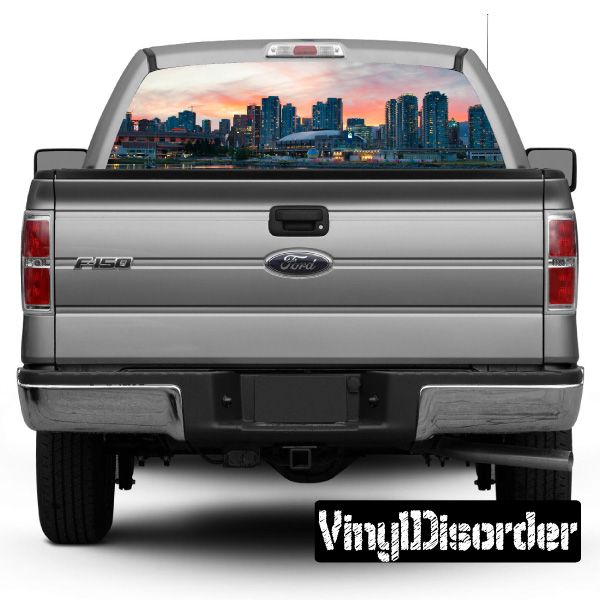 Gray pickup truck with rear window skyline graphic decal