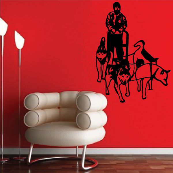 Sledding dog team wall decal with black sled dogs and handler silhouette