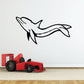 Black sleeping dolphin wall decal with simple line art silhouette