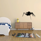 Black spider wall decal with long legs, sliding-style graphic