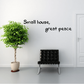 Wall decal with handwritten text: “Small house, great peace”