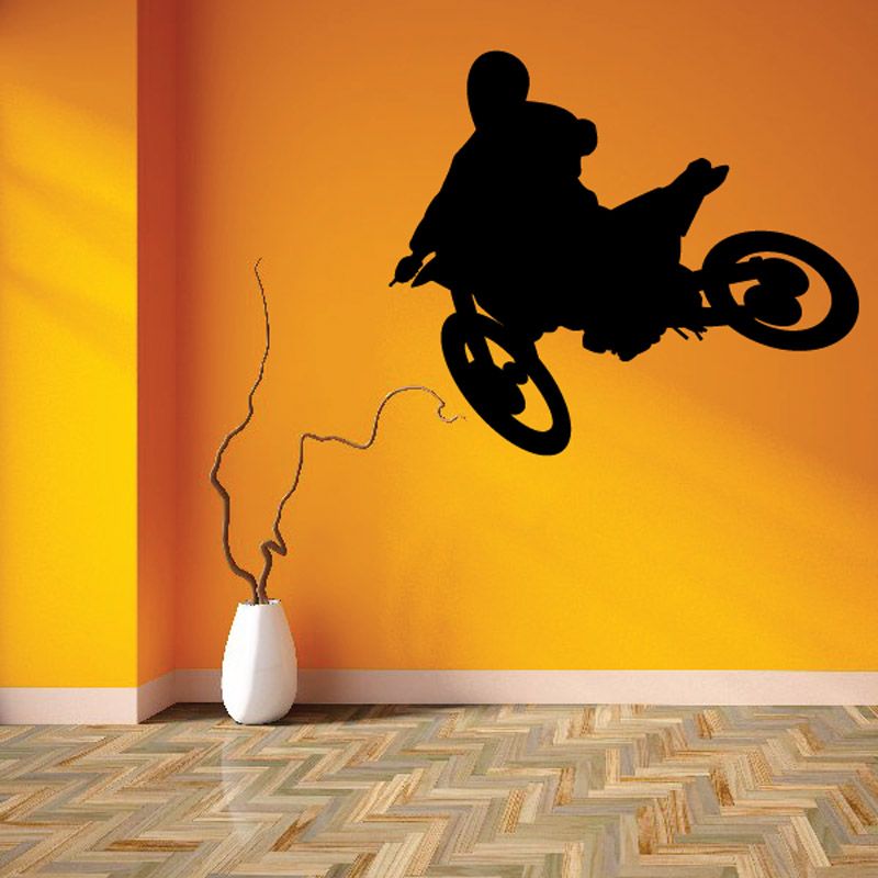 Small whip dirt bike decal, black riding silhouette on wall