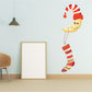 Smiling moon character decal holding red striped stocking, die-cut wall sticker