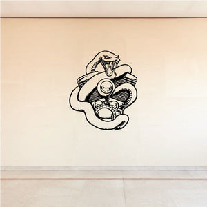 Engine decal with snake wrapped around a vintage engine illustration