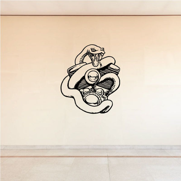 Engine decal with snake wrapped around a vintage engine illustration