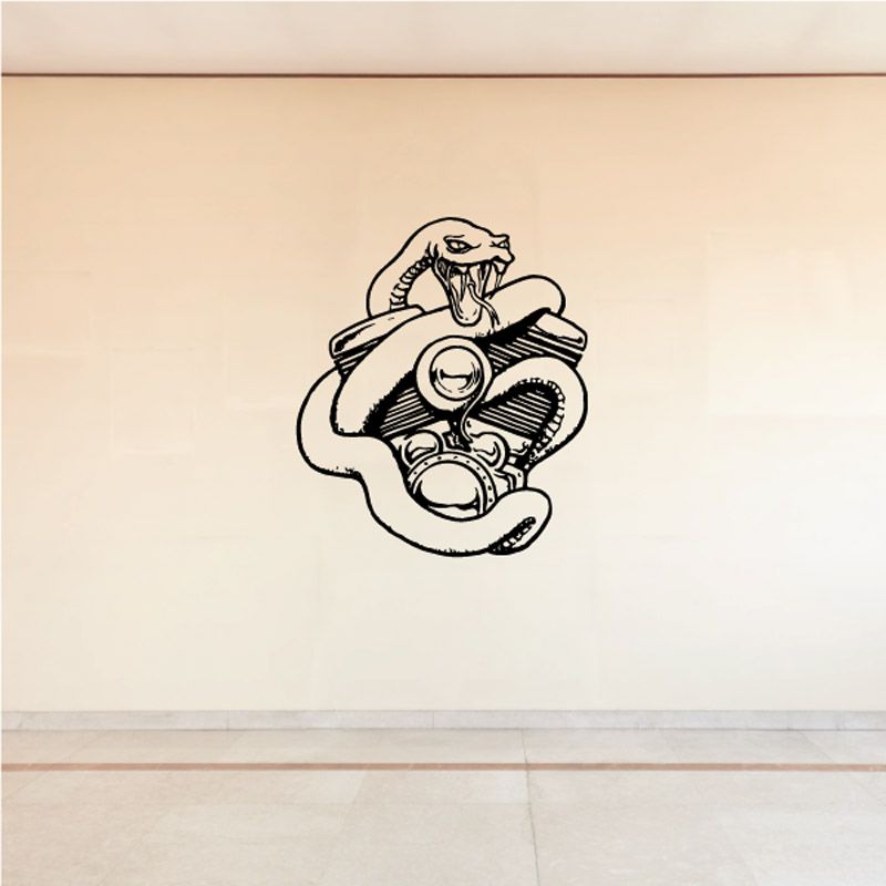 Engine decal with snake wrapped around a vintage engine illustration