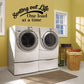 Laundry wall decal text: 'Sorting out Life One load at a time'