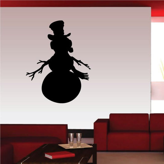 Image of Snow Man with Hat Earmuffs and Scarf Silhouette Decal