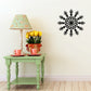 Snowflake decals accenting a side table with home decor