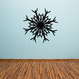 Adhesive fractal detailed snowflake decal on a wall