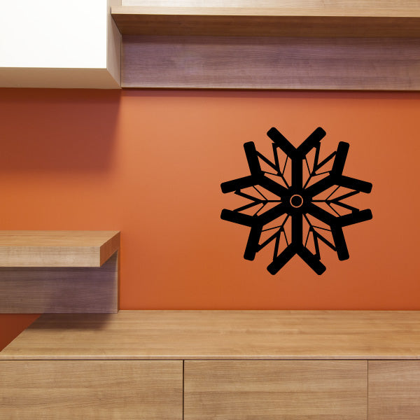 Snowflake-themed wall art in a modern laundry space