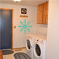 Kitchen interior enhanced with a snowflake motif wall sticker