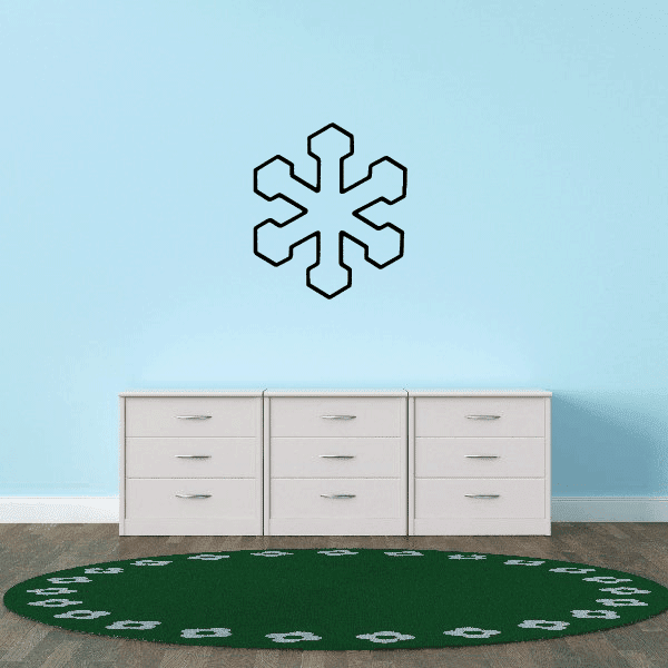 Elegant snowflake decal on the side of a white dresser