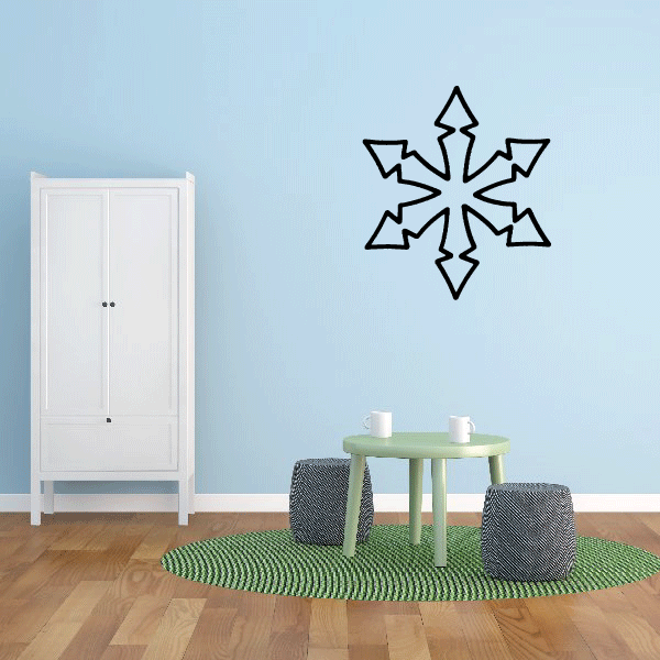 Decorative snowflake wall decals arranged in an arrow pattern